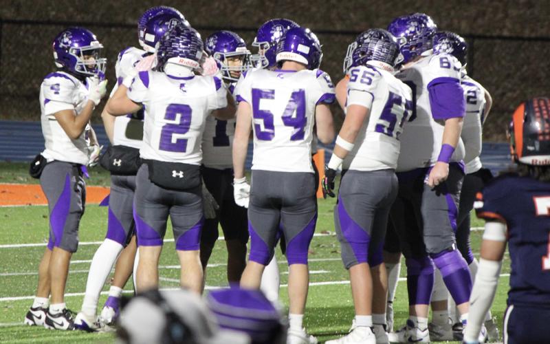 MNJ Photo/Blake Thayer.  The Mountaineers consider their options while playing the Mountain Island Charter School Rams. Mitchell High School lost to the Rams 58-22 on Black Friday.