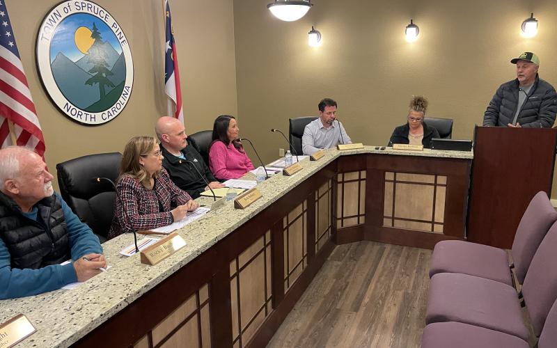 MNJ Photo/Mariel Williams.  Spruce Pine resident Martin Frady tells the Town Council about his quest to get water service restored for several weeks.