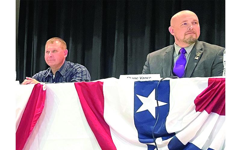 MNJ Photo/Mariel Williams.  Bob Hensley moderated a forum featuring Mitchell County sheriff candidates Thursday. From left are Cecil Hobson and Shane Vance.