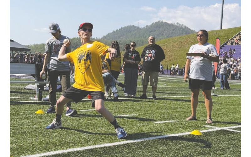 MNJ Photo/Jaren Gragg. Evan Bloemendaal throws a ball at the Special Olympics.