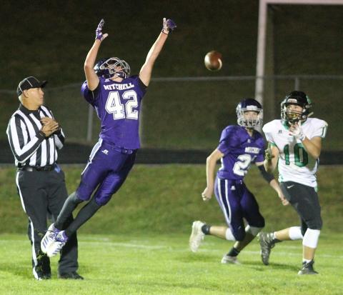 Mitchell High School junior varsity football player Gabe Brandt (No. 42) attempts to deflect a pass to a Mountain Heritage receiver being defended by Mitchell's Gage Young Thursday, Oct. 17, during the JV Mountaineers' 32-14 loss to rival Mountain Heritage in Ledger. (MNJ photo/Cory Spiers)
