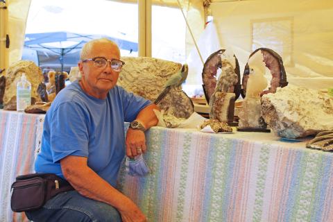 Mitchell County resident and Rocks and Things owner Mabel Benjamin poses for a photo Friday, July 31 in her booth at the Grassy Creek Gem and Mineral Show. The show proceeded despite the ongoing pandemic by utilizing health and safety precautions. (MNJ photo/Juliana Walker)