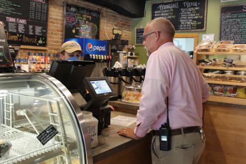 Spruce Pine Police Chief Bill Summerlin places his lunch order at DT’s Blue Ridge Java on Friday, Sept. 11. Local law enforcement officers were provided free meals at DT’s during the day courtesy of Sweet Creek Construction. Summerlin said the gesture means a lot to him. (MNJ photo/Juliana Walker)