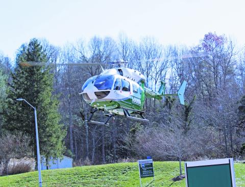 Mission Health’s new Mountain Area Medical Airlift (MAMA) craft makes its first descent into Spruce Pine on Tuesday, Nov. 17 at Blue Ridge Regional Hospital. The new craft, an EC-145e, will increase safety margins across all mission profiles and will increase the patient care area by 31 percent. (MNJ photo/Cory Spiers)