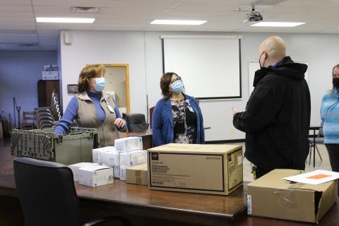 Blue Ridge Regional Hospital Administrative Manager of Clinical Operations Teressa Neill and BRRH CEO Tonia Hale speak with School Resource Officer Shane Vance about Stop the Bleed kits. (MNJ Photo/Juliana Walker)