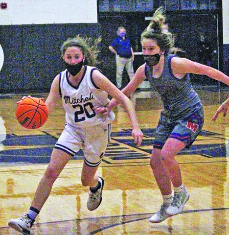 Junior guard Annali Silver drives past a Madison defender during a home game on Thursday, Jan. 21. Silver registered a pair of defensive rebounds and assists in 13 minutes played as the Mountaineers downed visiting Madison 56-24. (MNJ photo/Cory Spiers)