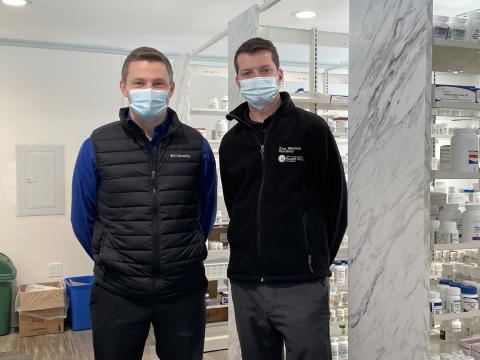 Pharmacists Anthony Hudson and Jordon Baker pose for a photo inside of the newly-opened Roan Mountain Pharmacy location in Bakersville. The Bakersville Pharmacy left after CVS bought the company that owned it, but Baker and Hudson wanted to bring a pharmacy back to town.  (MNJ photo/Juliana Walker)