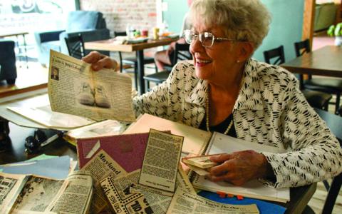 MNJ Photo/Sarah Atkins. Joyce Boone looks back on the many stories she wrote for the Mitchell News-Journal over a 30-year period.