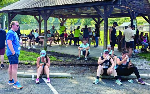 MNJ photos/Brian Hobson. After the race, competitors catch their breath and rehydrate after an exhausting run.