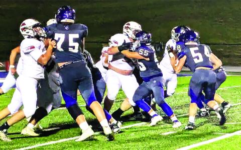 MNJ photos/Brian Hobson. Caleb Cook rolls to his right on a quarterback keeper.