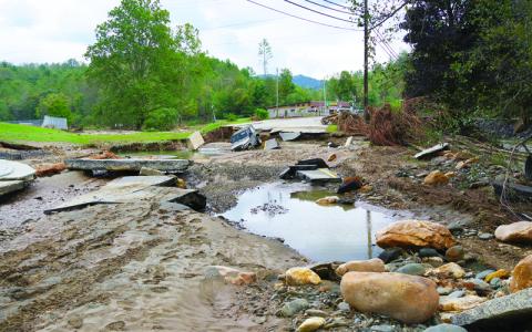 Special to MNJ/Judy Taylor.  Flooding on Sept. 27 washed out a 60-yard stretch of State Hwy. 226 in Bakersville.