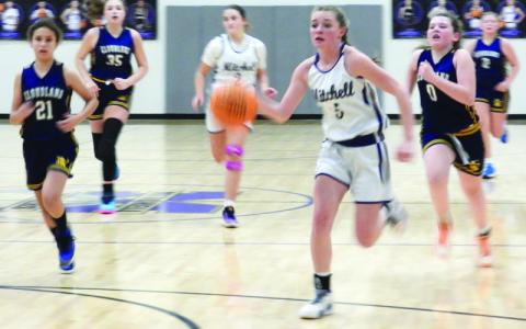 Submitted photo.  Cayma Farley leads the fast break against Cloudland.