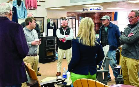 Submitted photo.  North Carolina Labor Commissioner Luke Farley, second from left, visits with local business owners at DT’s Junior Java.