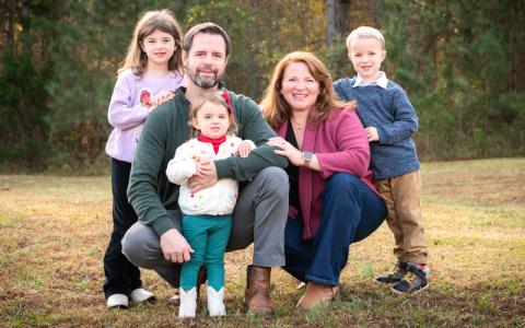 Photo submitted.  Incoming Spruce Pine manager Daniel Stines, his wife Lauren, and their children are not strangers to Spruce Pine. Daniel has family roots in Yancey County.  