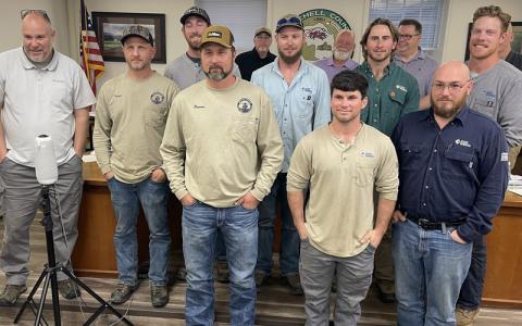 MNJ Photo/Mariel Williams.  The Mitchell County Board of Commissioners honored local electric company workers at a meeting last week. Friday is National Linemen Appreciation Day.