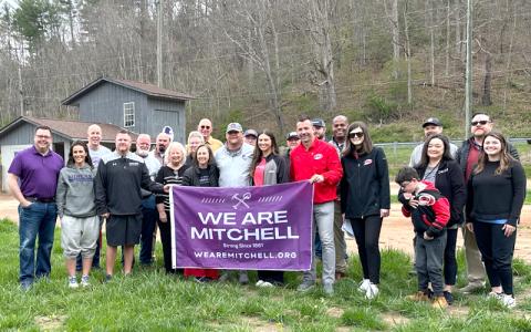 Submitted photo.  Representatives of the Carolina Hurricanes met with members of the Mitchell County Board of Commissions and county staff as they presented the county with $150,000 to help restore the Wade Tipton Memorial Park in Bakersville.