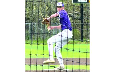 Submitted photo.  Riley Silvers winds up a pitch for the Mitchell High School Mountaineers.