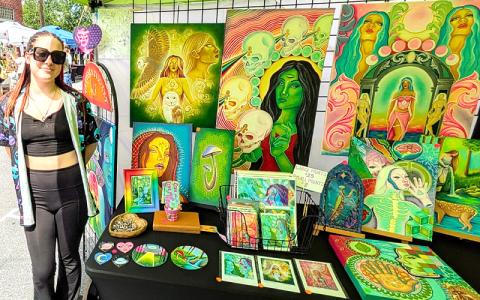 MNJ Photo/Steffen Silvis.  Hundreds filled downtown Spruce Pine Saturday for the annual Spruce Pine Alien Festival. The festival featured a wide variety of merchandise for sale, including T-shirts, costumes and original art. Festive attire at the festival ranged from simple “alien eyes” sunglasses to full costumes.