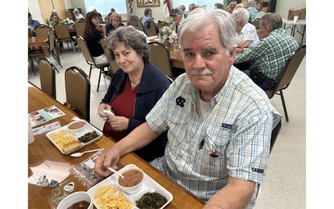 MNJ Photo/Noreen Nickolas.  Richard and Marjean Benton, who live in Bakersville, enjoy a meal at the Senior Center.