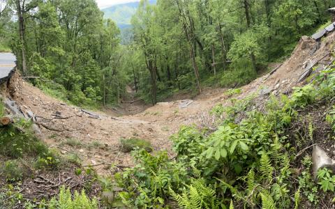 MNJ Photo/Mariel Williams.  This panoramic view of the Blue Ridge Parkway washout near Little Switzerland distorts the width of the hole slightly in order to get the full scope of the damage in view.