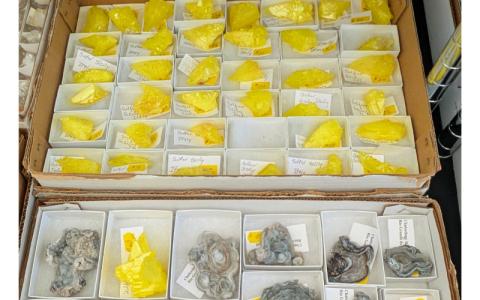 MNJ Photo/Steffen Silvis.  This yellow mineral on display at the Grassy Creek Mineral and Gem Show is a sample of crystalized sulfur from Mount Etna in Italy. 