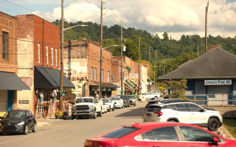 Colby Rabon / Carolina Public Press.  Scenes from along Locust Street in downtown Spruce Pine on Sept. 11, 2025. The Western NC town sustained major damage during Helene. Many stores have reopened but others are under repair or remain shuttered.