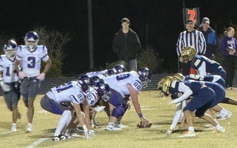 MNJ Photo/Blake Thayer.  The Mitchell High School Mountaineers, left, face off against the Bishop McGuinness Catholic High School Villains. Mitchell defeated the Kernersville team 42-12 and will advance to the next round of the playoffs Friday with a home game at 7 p.m.