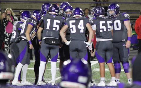 MNJ Photo/Blake Thayer.  The Mitchell High School Mountaineers strategize for their big Senior Night victory over the Avery Vikings.