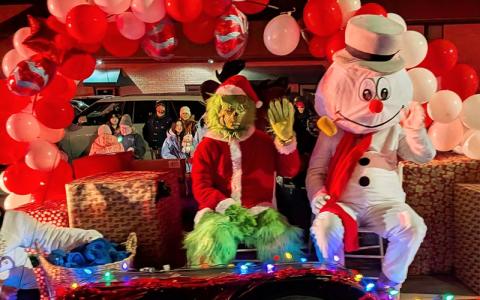 MNJ Photo/Steffen Silvis.  The Grinch makes one of many appearances in the Spruce Pine Christmas Parade.