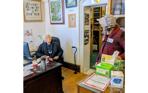 MNJ Photo/ Steffen Silvis. Rhonda Gunter and Jaime Shrier discuss genealogy at the Mitchell County Historical Society open house. 