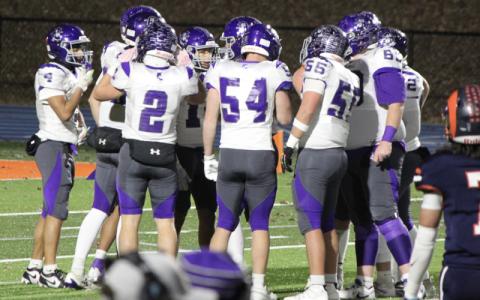 MNJ Photo/Blake Thayer.  The Mountaineers consider their options while playing the Mountain Island Charter School Rams. Mitchell High School lost to the Rams 58-22 on Black Friday.