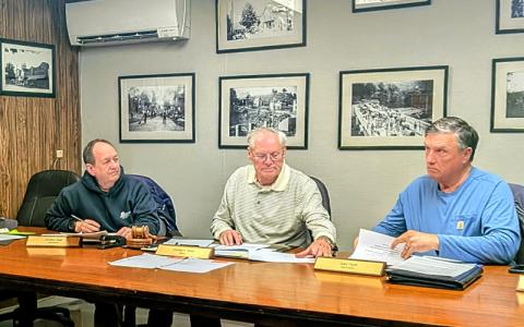MNJ Photo/Steffen Silvis.  From left, Councilman Charles Nash, Mayor Charles Vines and Councilman Gary Hyatt listen to a presentation on plans to reinvigorate Bakersville.