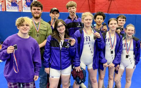 Submitted photo.  The Mitchell High School Mountaineers show off their 2026 Western Highland Conference medals.