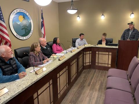 MNJ Photo/Mariel Williams.  Spruce Pine resident Martin Frady tells the Town Council about his quest to get water service restored for several weeks.