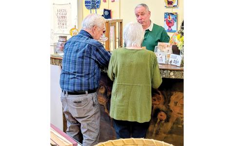 MNJ Photo/Steffen Silvis.   Mica Gallery President Robbie Bell helms a busy register.