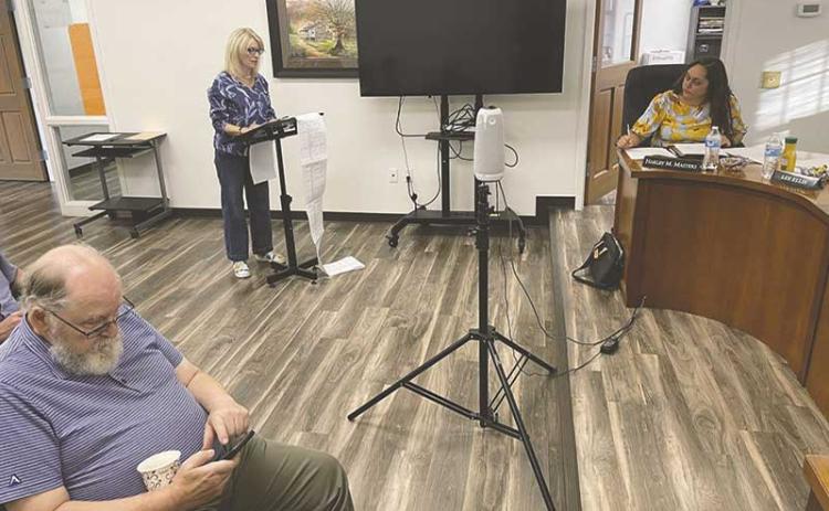 MNJ Photo/Mariel Williams - Lea Charlton of Spruce Pine addresses the Mitchell County Board of Commissioners. Charlton read from an extensive list that she said documented instances in which Flock Safety cameras have been abused.