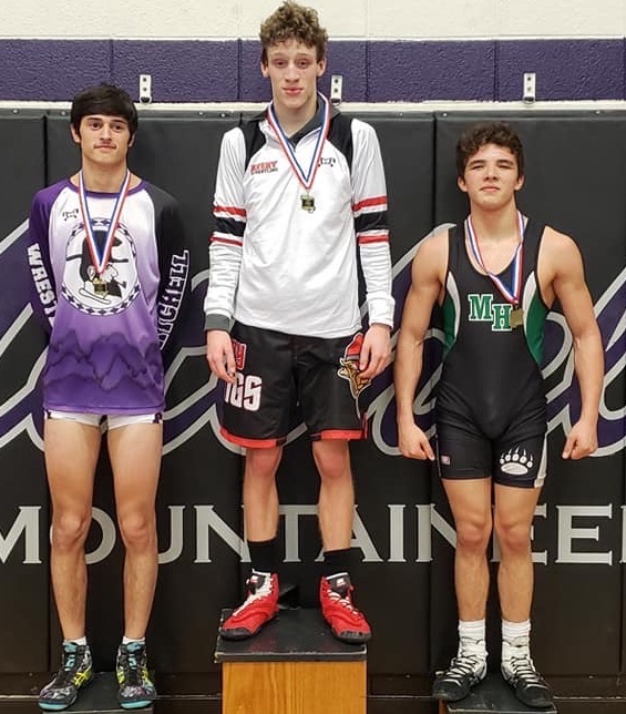 Mitchell senior Seth Elsaesser, left, won third place in the 138-pound weight class at the Western highlands Conference Tournament. (Submitted)