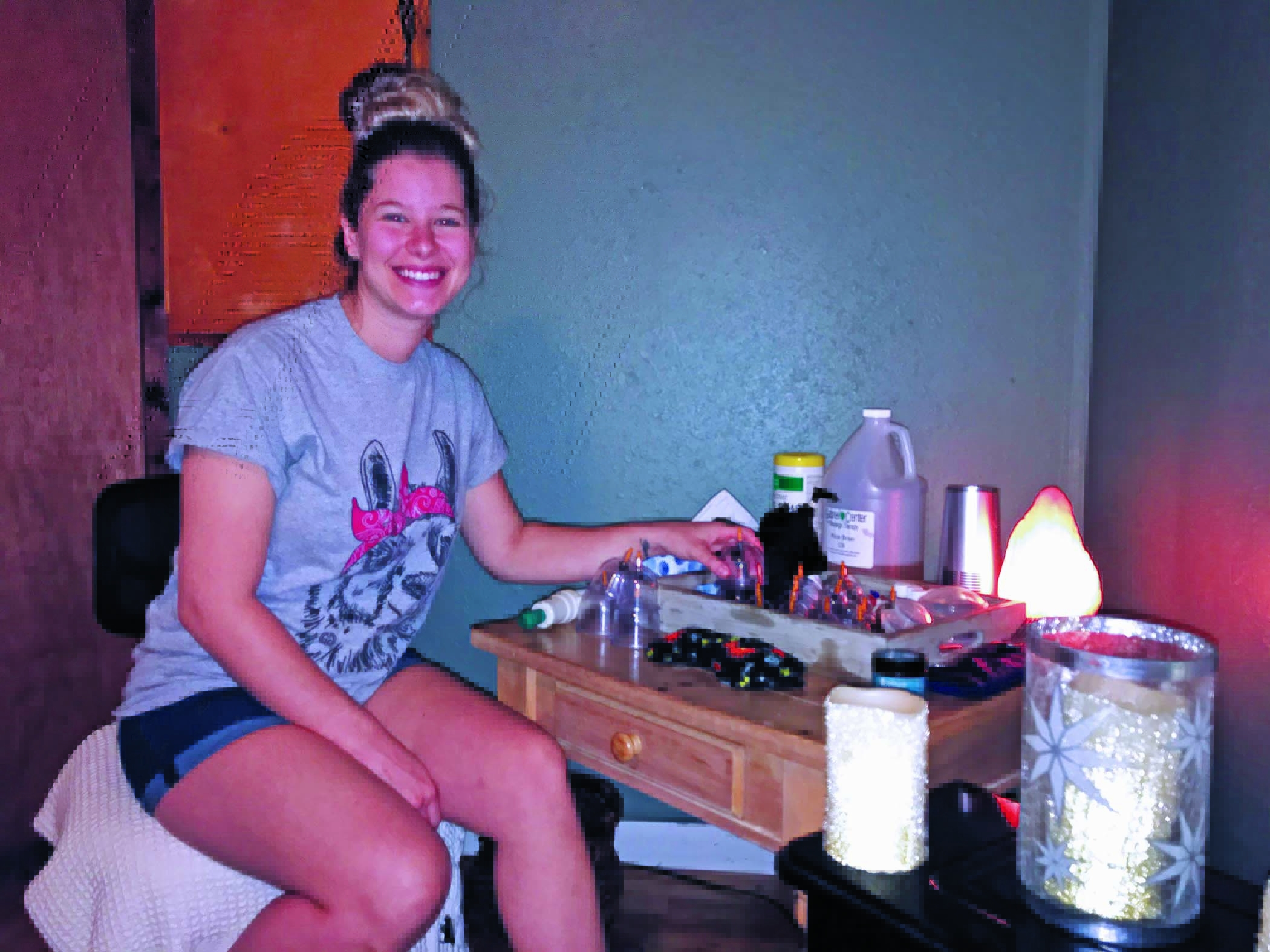 Jessie Bomar smiles as she prepares to give a client a massage at her business, Ohana. Bomar offers injury recovery and relaxation massages in her studio. She has been open since 2018 but has recently captured the most business she has had to date. (MNJ photo/Cory Spiers)