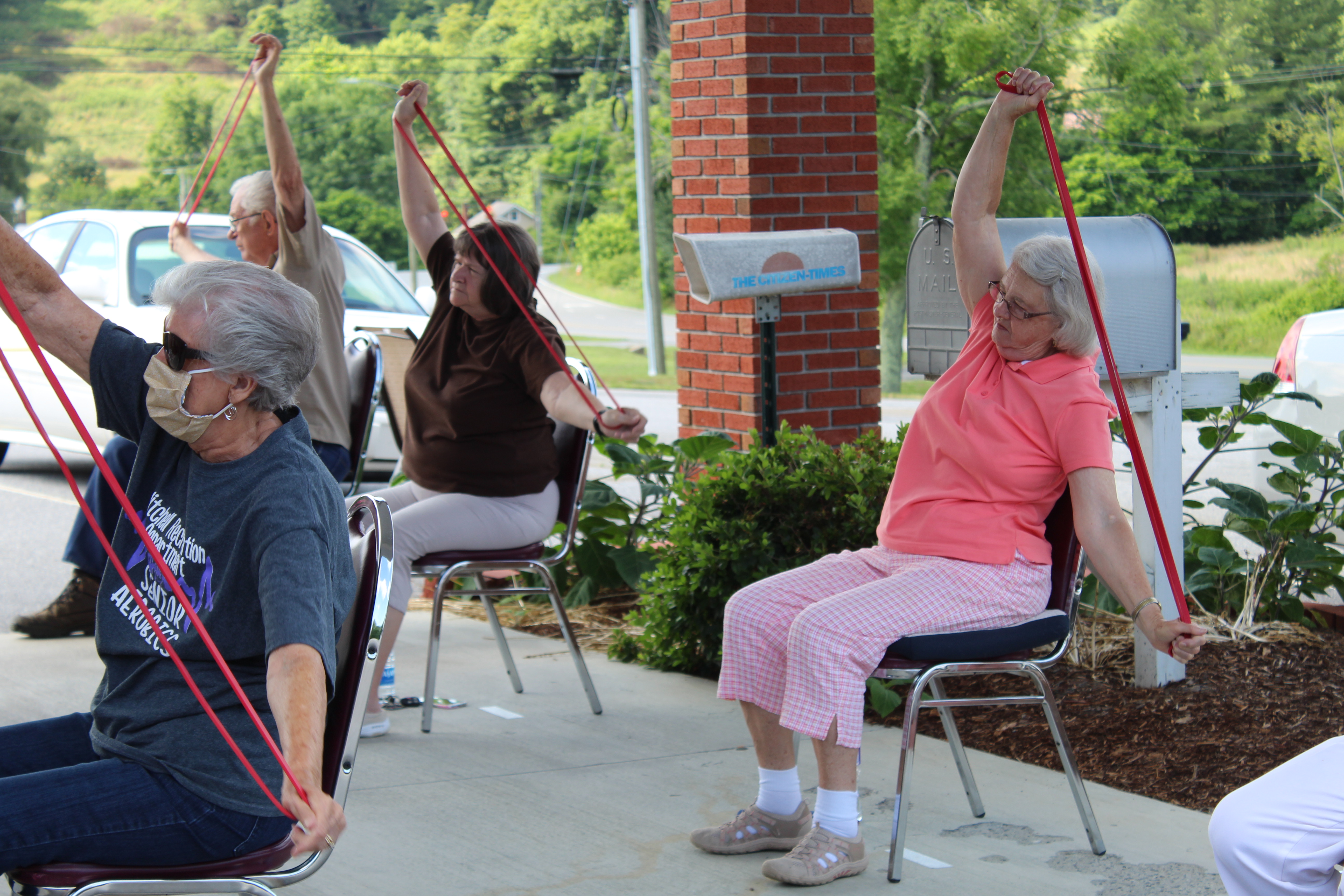 Class attendees stretch out their arms with exercise bands during an exercise class led by Mitchell County Director of Recreation Brock Duncan at the Senior Center. Pictured Left to Right: Mila Black, Jean Newton and Mattie Sparks. Photos by Juliana Walker/MNJ