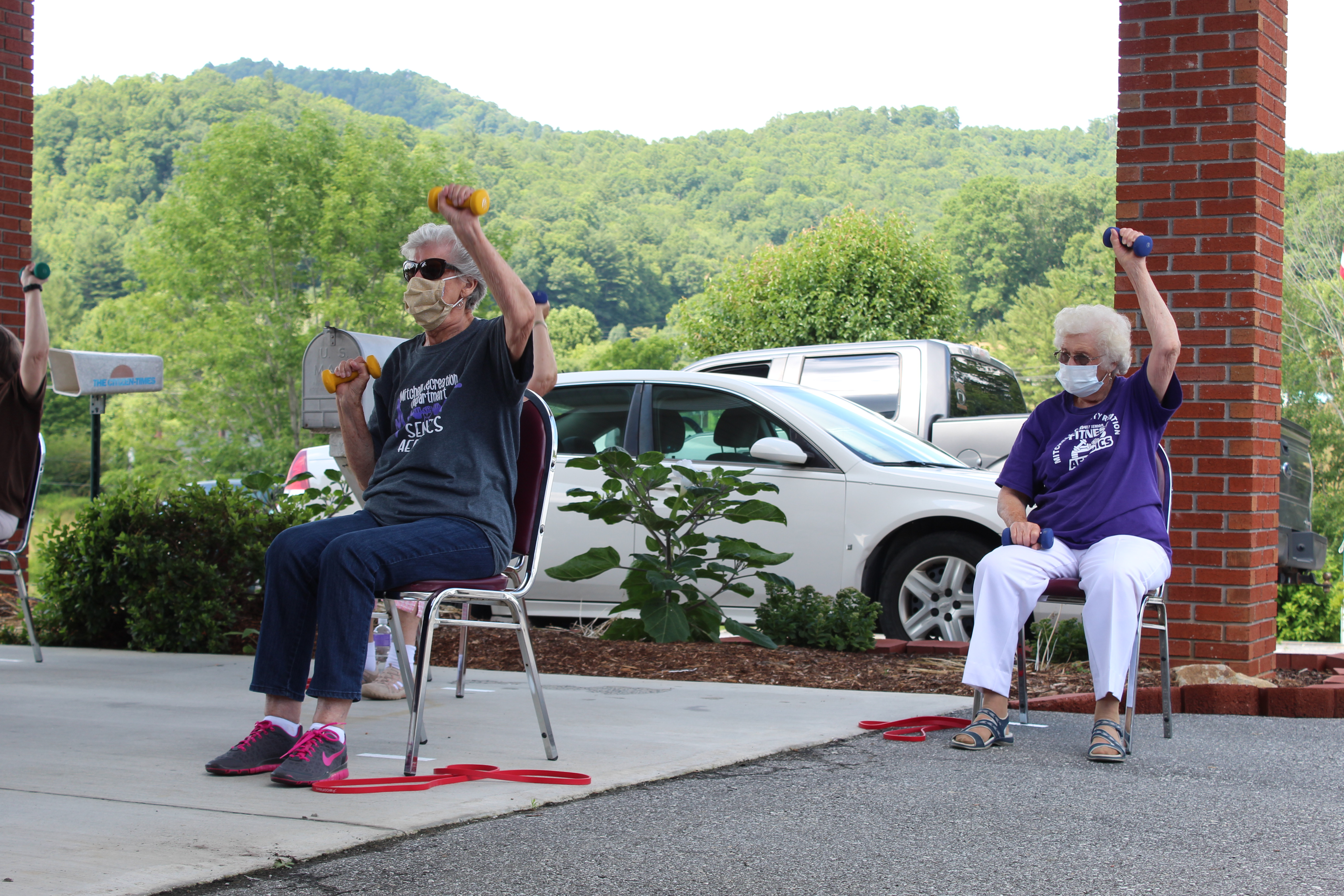 Seniors participate in an exercise class at the Mitchell County Senior Center. Pictured Left to Right: Mila Black and Kathleen Buchana. Photos by Juliana Walker/MNJ