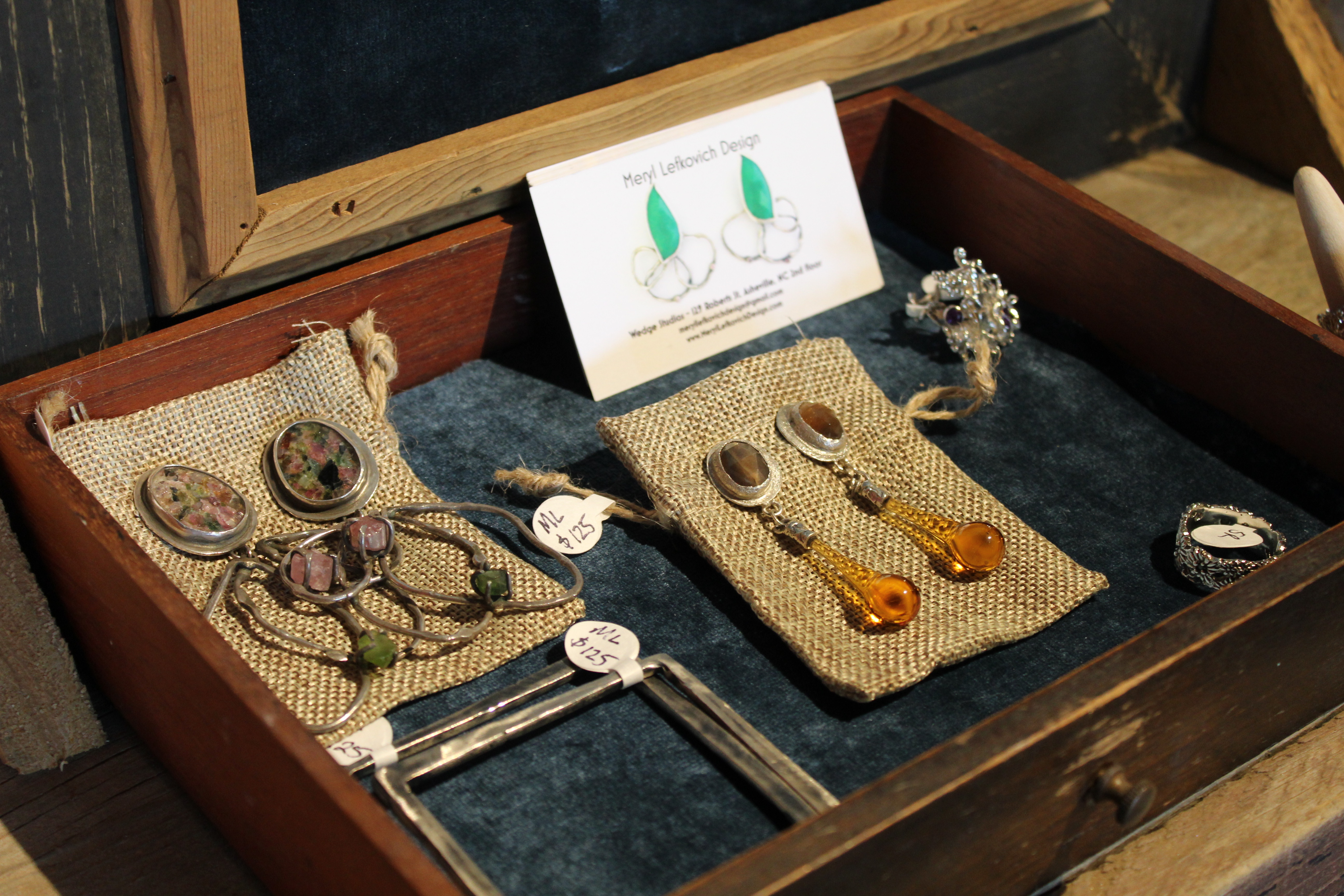 Sweetgrass Artisan Mercantile sells an array of original arts and crafts from local artisans including paintings, jewelry and wood-work. Pictured here are jewelry pieces from Meryl Lefkovich Design. (MNJ photo/Juliana Walker)