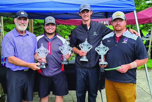 Billy Graham Evangelistic Association Executive Vice President Ken Karun with second flight tournament winners Greyson Stafford, Drey Phillips and Jamison Burleson. Not pictured is Austin Mask. (Photo by Rocky Branch)