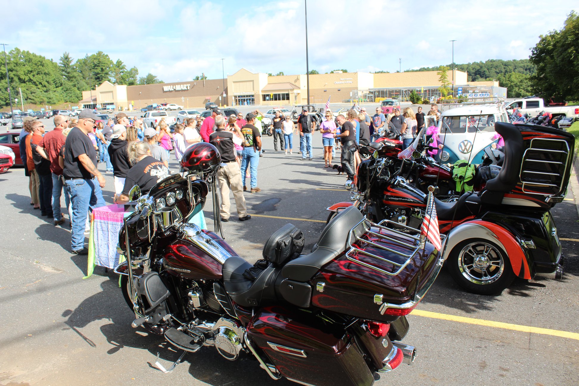 The participants of the second annual Maggie’s Ride gather around and hear a short speech from Amy Young before starting their engines and leaving as a collective unit. (MNJ photo/Cory Spiers)