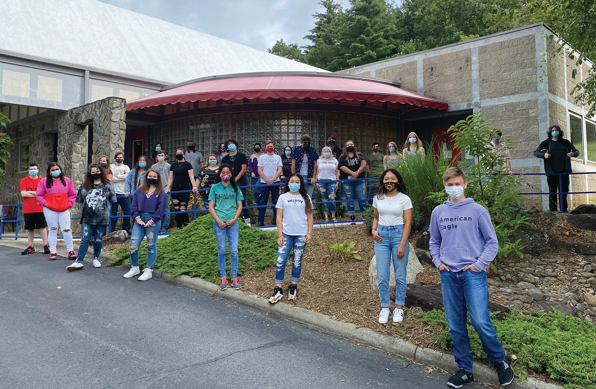 Students at Mayland Early College High stand outside of their school socially distanced and masked before the start of the first days of instruction this past week. (Photo courtesy of MECHS)
