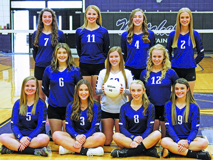 The Mitchell High varsity and junior varsity volleyball teams met on Friday, Dec. 4 for team photos. Varsity volleyball: In the back row, from the left, is Annali Silver, Savannah Banks, Marybeth Woody and Meredith Dellinger. In the middle row, from the left, is Peighton Robison, Brooke Brewer and Zayda Carver. In the front row, seated from the left, is Paigelyn Branch, Chloe Carter, Erika Gouge and Bailey Brinkley. (MNJ photo/Cory Spiers)