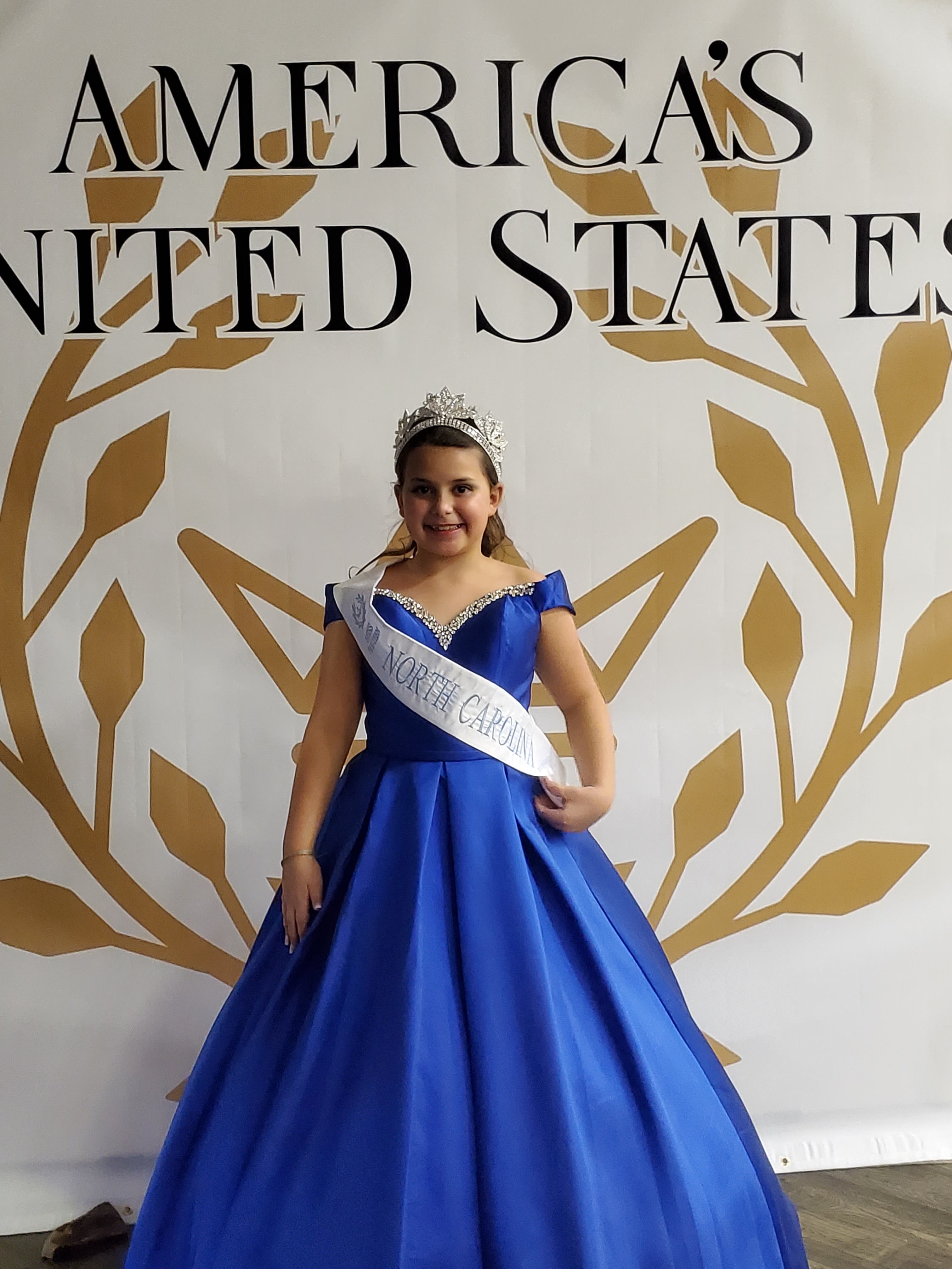 Katelynn Sillman poses for a photo while wearing her pageant attire. Sillman, 10, was crowned Miss Pre-Teen North Carolina earleir this month and received a sash and crown. (Submitted photo)
