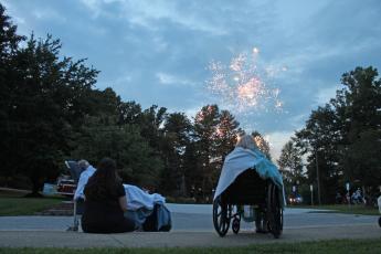 Brian Center residents cozy up with blankets as they watch a special fireworks show on Thursday, Aug. 20. Spruce Pine Police Chief Bill Summerlin raised funds to provide a show and ice cream for residents of the Brian Center and Mitchell House. (MNJ photo/Juliana Walker)