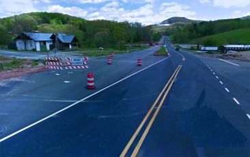 The orange cones and barricades on U.S. 19E are now gone as the highway widening project is finished. The $64.9 million project widened eight miles of U.S. 19E from Yancey County. (MNJ photo/Cory Spiers)