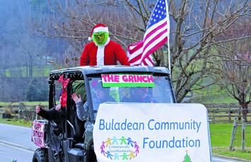 A Buladean Community Foundation vehicle highlighted by an appearance from The Grinch was one of the first entries in the Buladean Christmas Parade, which brought the community together on Saturday, Dec. 5 to ring in the holiday season. There were about 40 entries in the parade. (MNJ photo/Cory Spiers)