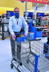 Mitchell County Sheriff Donald Street dons his face covering and gets ready to shop at Walmart on Monday, Dec. 14 for the 12th annual Shop With a Cop event. (Submitted)